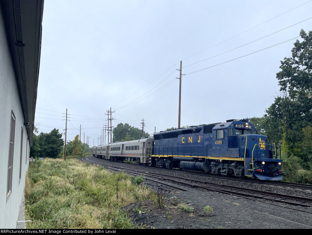 The 4109 leads Train # 1023 past the Lackawanna Boonton freight house 